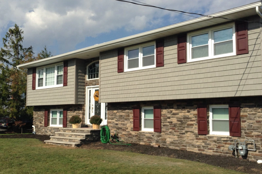 house with exterior masonry and siding