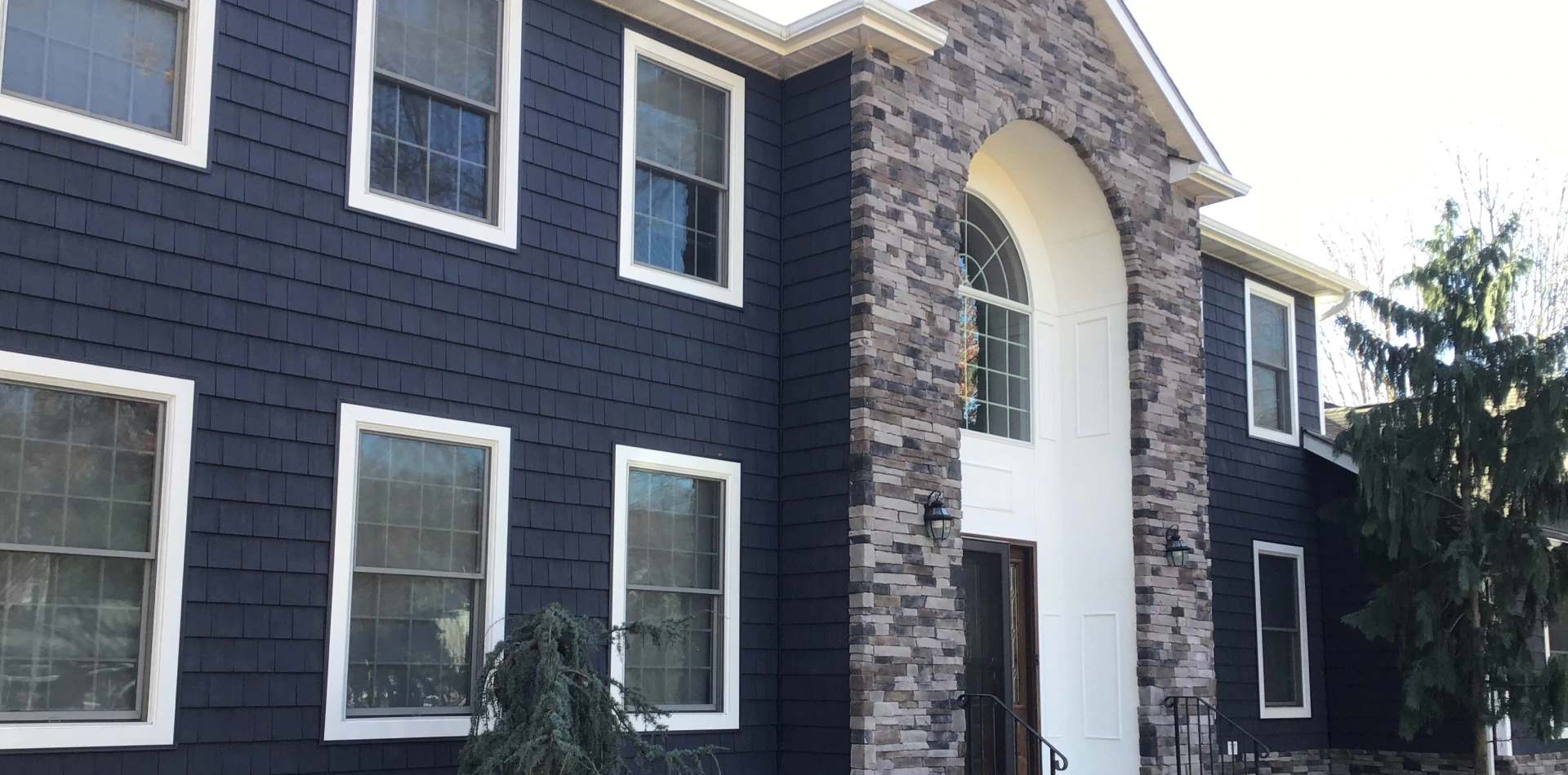 exterior view of a house with a newly installed siding